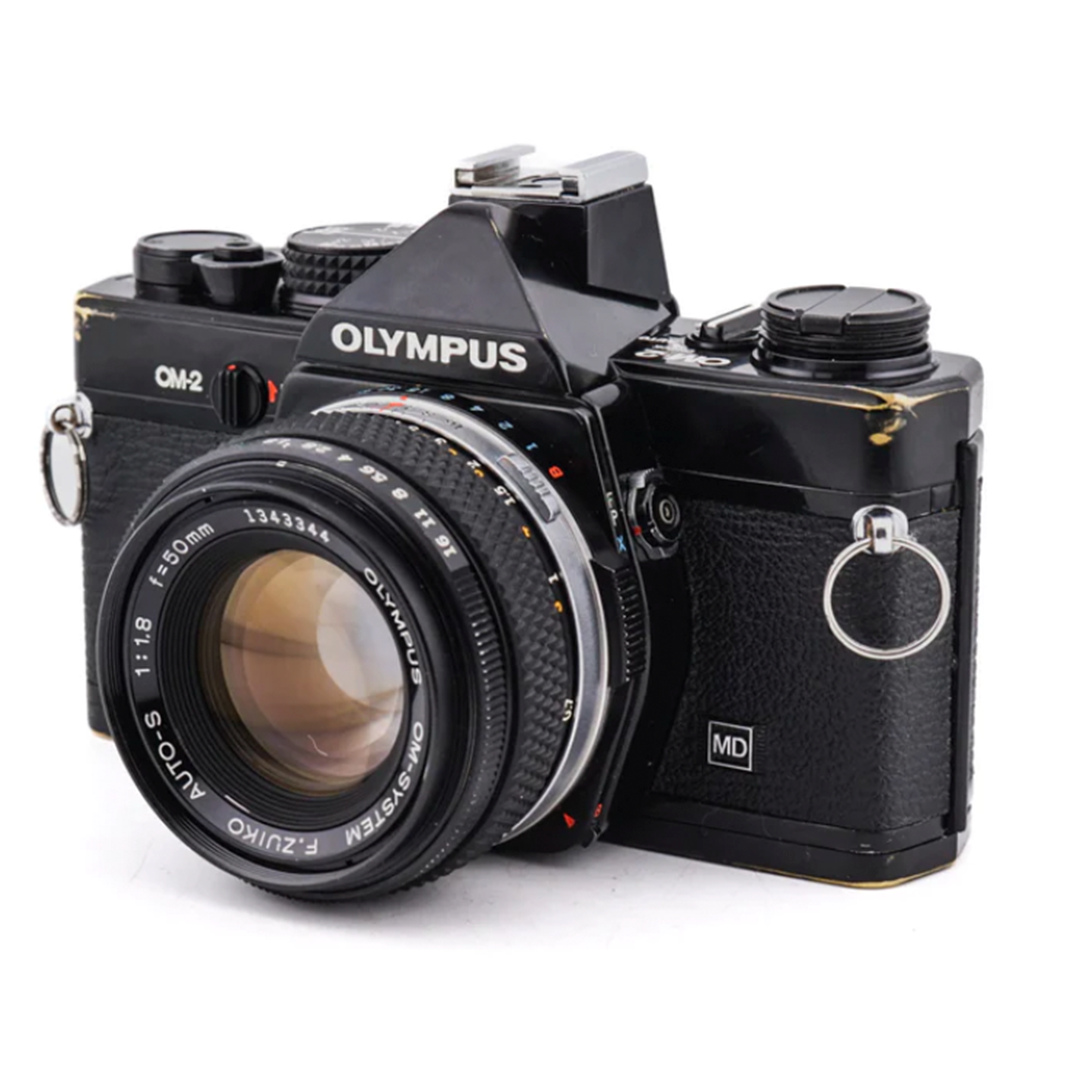 Olympus OM-2 + 50mm f1.8 F.Zuiko Auto-S - Cámara Vintage SLR de 35mm · imagen principal